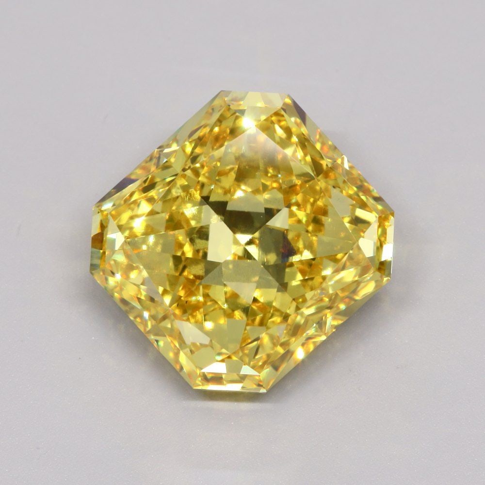 Loose Diamond - RADIANT 12.01ct Fancy Vivid Yellow VS1: Loose Diamond - RADIANT 12.01ct Fancy Vivid Yellow VS1 Source: This is a real non-mined Diamond that has been grown in a lab Shape: RADIANT Carats: 12.01 Color: Fancy Vivid Yellow Certification: IGI V