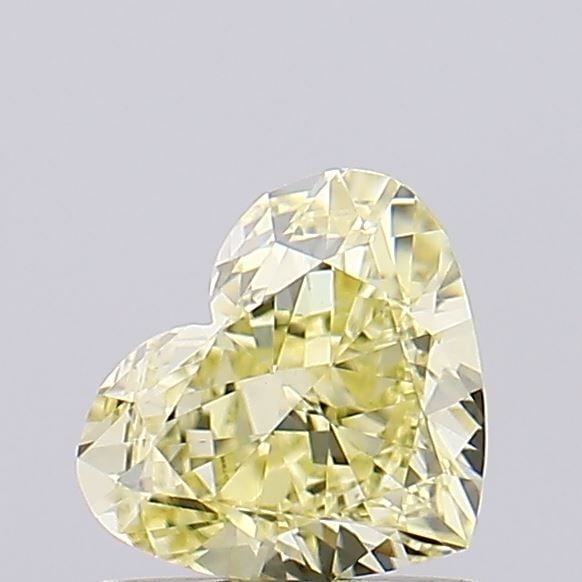 Loose Diamond - HEART 1.0ct Fancy Yellow VVS2: Loose Diamond - HEART 1.0ct Fancy Yellow VVS2 Source: This is a real non-mined Diamond that has been grown in a lab Shape: HEART Carats: 1.0 Color: Fancy Yellow Certification: IGI Video: