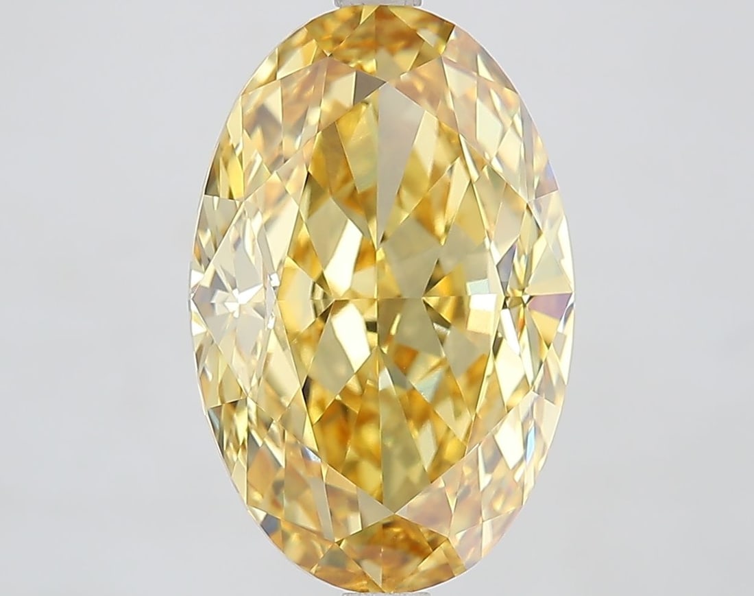 Loose Diamond - OVAL 7.06ct Fancy Vivid Yellow VVS2: Loose Diamond - OVAL 7.06ct Fancy Vivid Yellow VVS2 Source: This is a real non-mined Diamond that has been grown in a lab Shape: OVAL Carats: 7.06 Color: Fancy Vivid Yellow Certification: IGI Video: