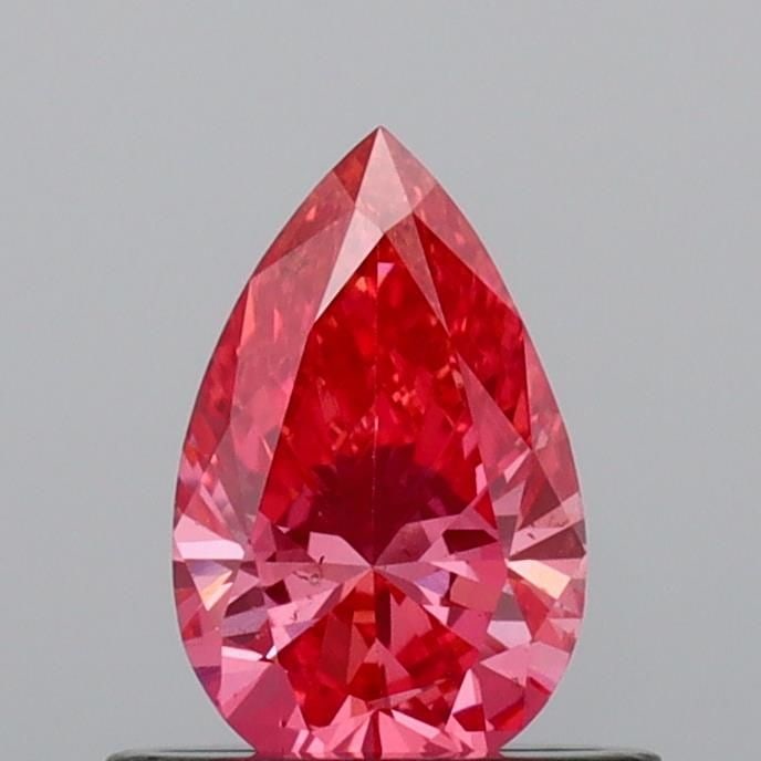 Loose Diamond - PEAR 0.51ct Fancy Vivid Pink VS2: Loose Diamond - PEAR 0.51ct Fancy Vivid Pink VS2 Source: This is a real non-mined Diamond that has been grown in a lab Shape: PEAR Carats: 0.51 Color: Fancy Vivid Pink Certification: IGI Video: