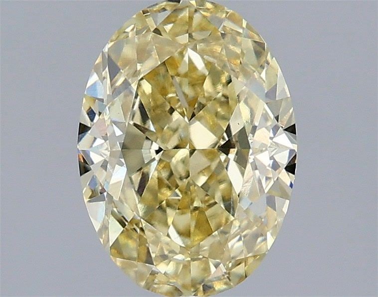 Loose Diamond - OVAL 2.1ct Fancy Intense Yellow VS1: Loose Diamond - OVAL 2.1ct Fancy Intense Yellow VS1 Source: This is a real non-mined Diamond that has been grown in a lab Shape: OVAL Carats: 2.1 Color: Fancy Intense Yellow Certification: IGI Video: