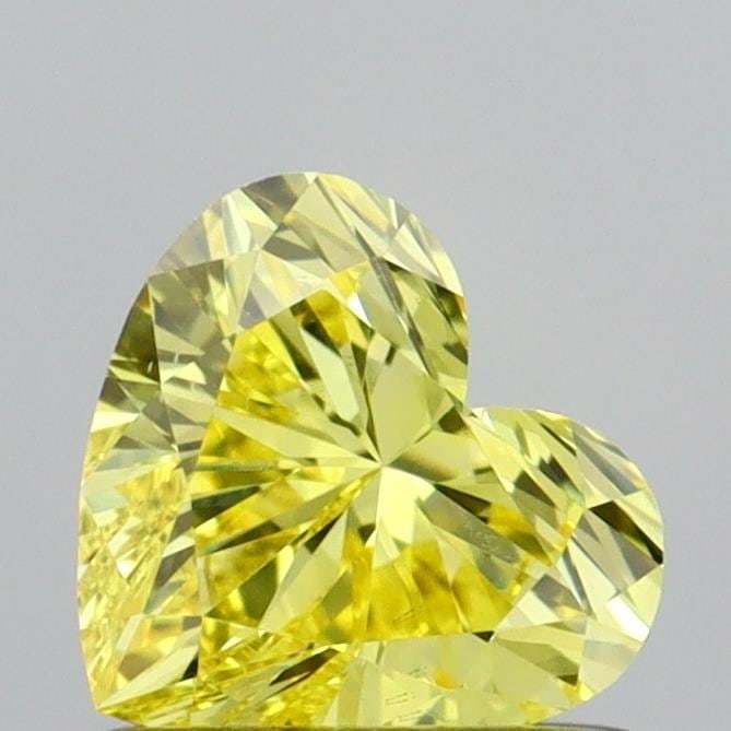 Loose Diamond - HEART 0.68ct Fancy Vivid Yellow VS2: Loose Diamond - HEART 0.68ct Fancy Vivid Yellow VS2 Source: This is a real non-mined Diamond that has been grown in a lab Shape: HEART Carats: 0.68 Color: Fancy Vivid Yellow Certification: IGI Video: