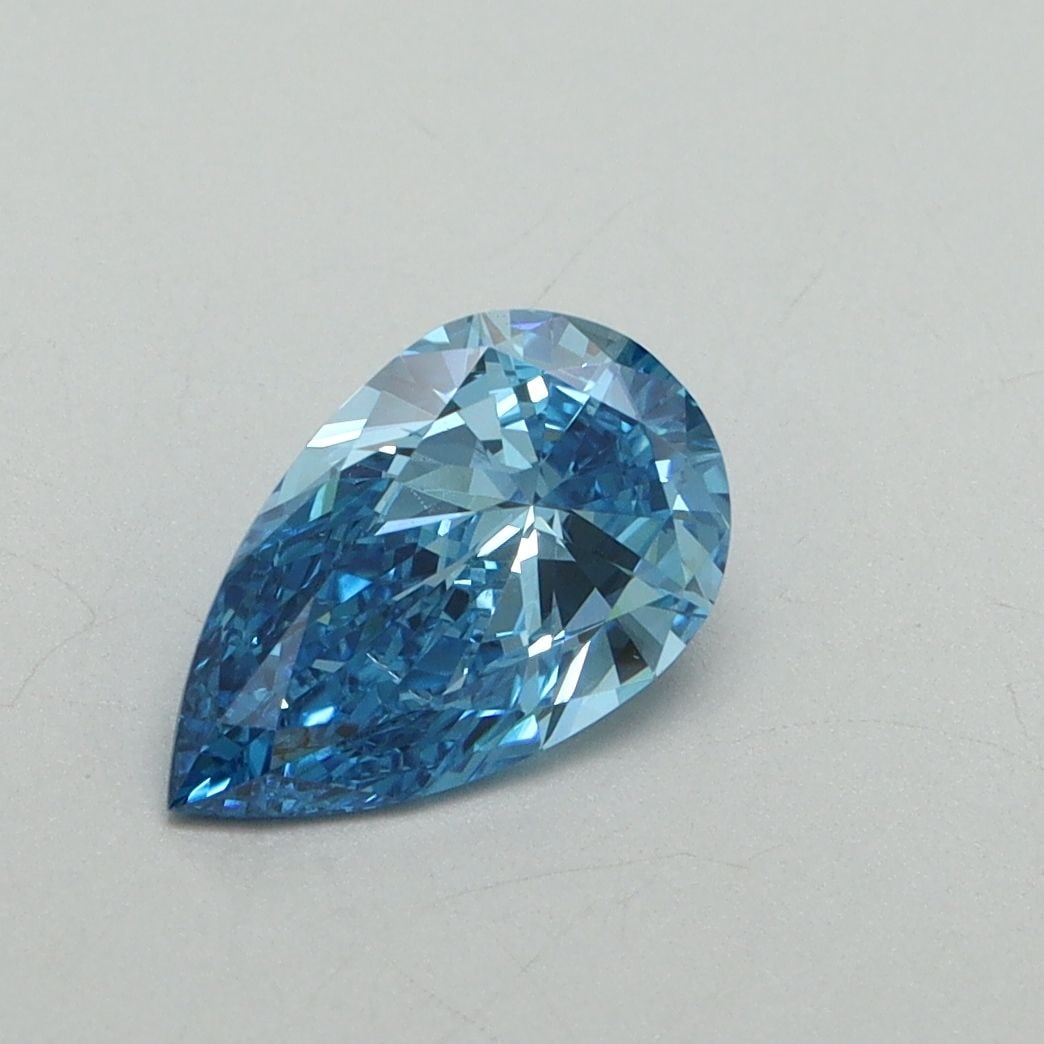 Loose Diamond - PEAR 1.0ct Fancy Vivid Blue VS2: Loose Diamond - PEAR 1.0ct Fancy Vivid Blue VS2 Source: This is a real non-mined Diamond that has been grown in a lab Shape: PEAR Carats: 1.0 Color: Fancy Vivid Blue Certification: IGI Video: