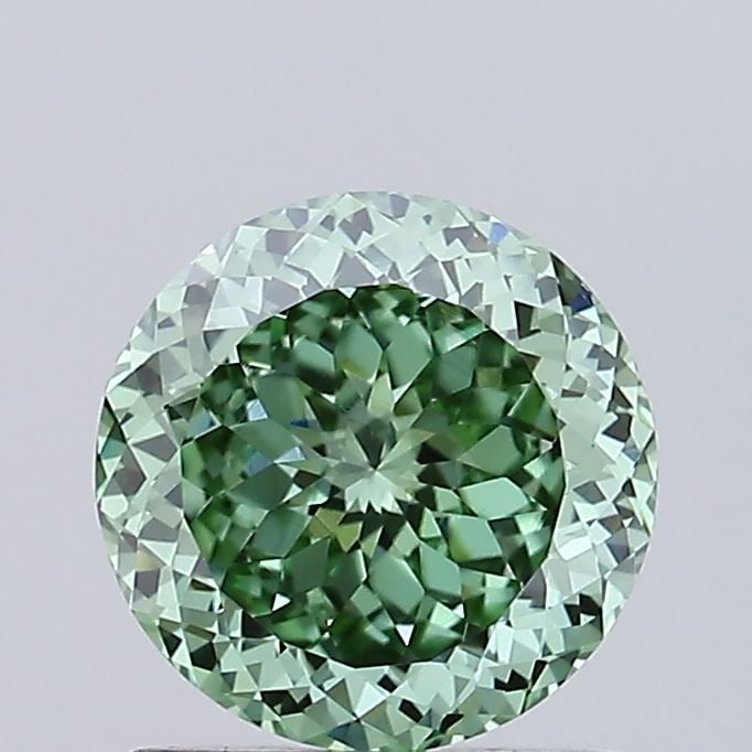 Loose Diamond - ROUND 0.97ct Fancy Vivid Green VVS2: Loose Diamond - ROUND 0.97ct Fancy Vivid Green VVS2 Source: This is a real non-mined Diamond that has been grown in a lab Shape: ROUND Carats: 0.97 Color: Fancy Vivid Green Certification: IGI Video:
