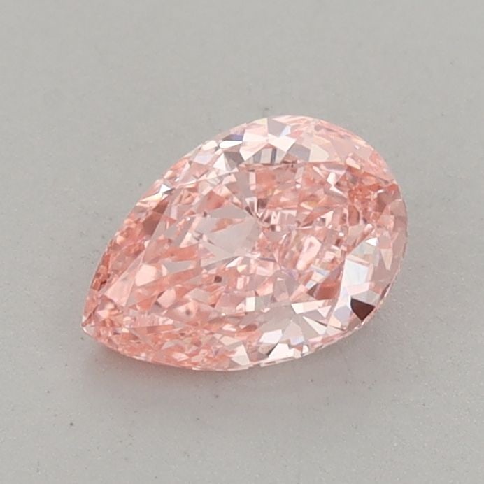 Loose Diamond - PEAR 0.69ct Fancy Vivid Pink VS2: Loose Diamond - PEAR 0.69ct Fancy Vivid Pink VS2 Source: This is a real non-mined Diamond that has been grown in a lab Shape: PEAR Carats: 0.69 Color: Fancy Vivid Pink Certification: IGI Video: