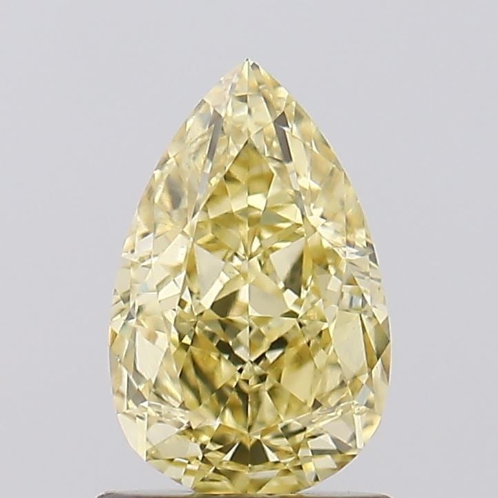 Loose Diamond - PEAR 1.24ct Fancy Yellow VS1: Loose Diamond - PEAR 1.24ct Fancy Yellow VS1 Source: This is a real non-mined Diamond that has been grown in a lab Shape: PEAR Carats: 1.24 Color: Fancy Yellow Certification: IGI Video: