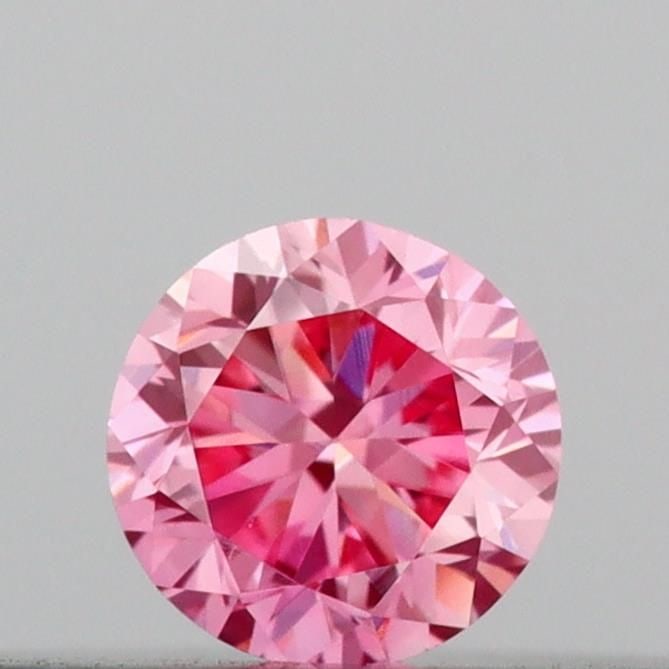 Loose Diamond - ROUND 0.1ct Fancy Vivid Pink VS1: Loose Diamond - ROUND 0.1ct Fancy Vivid Pink VS1 Source: This is a real non-mined Diamond that has been grown in a lab Shape: ROUND Carats: 0.1 Color: Fancy Vivid Pink Certification: IGI Video: