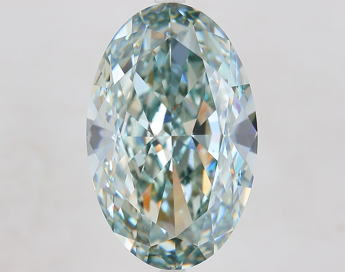 Loose Diamond - OVAL 13.56ct Fancy Blueish Green VS1: Loose Diamond - OVAL 13.56ct Fancy Blueish Green VS1 Source: This is a real non-mined Diamond that has been grown in a lab Shape: OVAL Carats: 13.56 Color: Fancy Blueish Green Certification: IGI Video