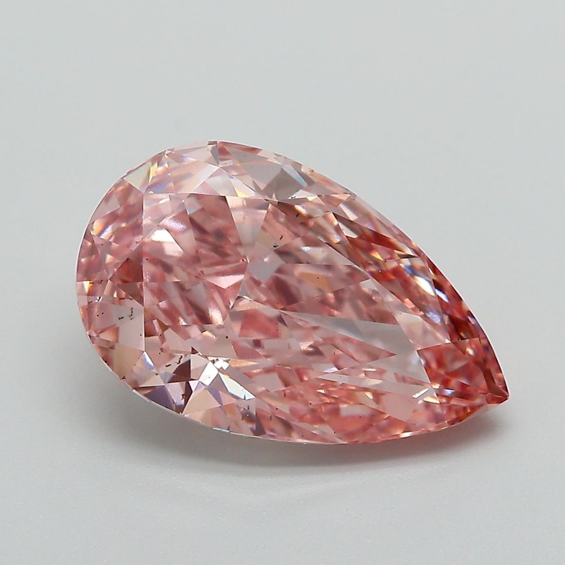 Loose Diamond - PEAR 5.28ct Fancy Vivid Pink VS2: Loose Diamond - PEAR 5.28ct Fancy Vivid Pink VS2 Source: This is a real non-mined Diamond that has been grown in a lab Shape: PEAR Carats: 5.28 Color: Fancy Vivid Pink Certification: IGI Video: