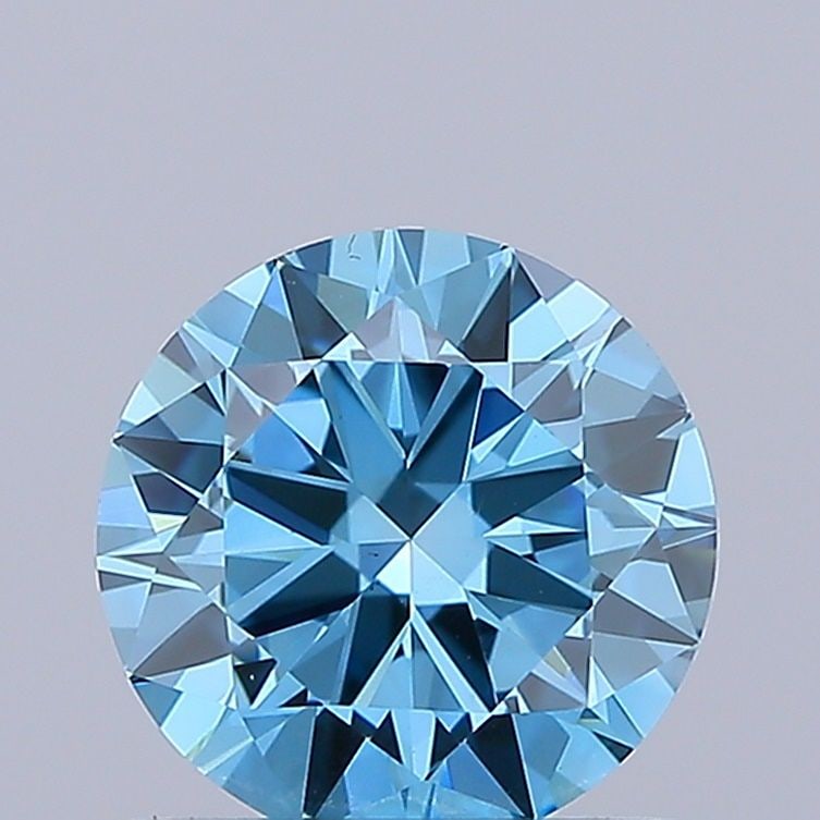 Loose Diamond - ROUND 1.0ct Fancy Vivid Blue VS2: Loose Diamond - ROUND 1.0ct Fancy Vivid Blue VS2 Source: This is a real non-mined Diamond that has been grown in a lab Shape: ROUND Carats: 1.0 Color: Fancy Vivid Blue Certification: IGI Video: