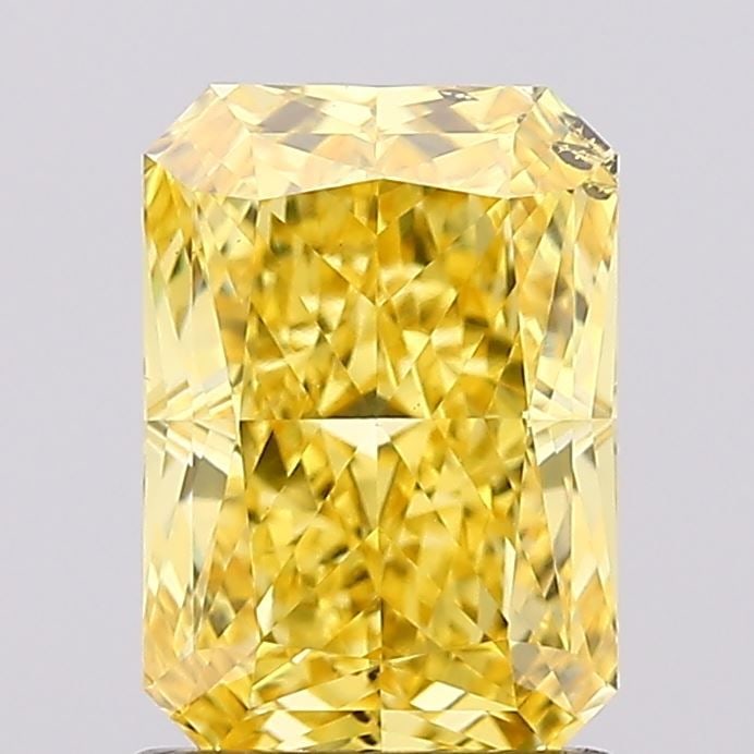 Loose Diamond - RADIANT 1.51ct Fancy Vivid Yellow SI2: Loose Diamond - RADIANT 1.51ct Fancy Vivid Yellow SI2 Source: This is a real non-mined Diamond that has been grown in a lab Shape: RADIANT Carats: 1.51 Color: Fancy Vivid Yellow Certification: IGI Vid