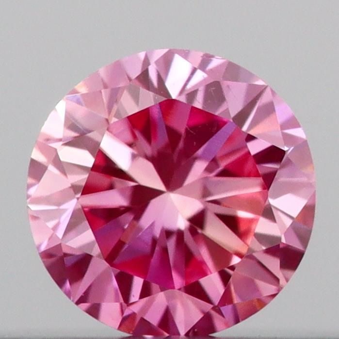 Loose Diamond - ROUND 0.16ct Fancy Vivid Pink VS2: Loose Diamond - ROUND 0.16ct Fancy Vivid Pink VS2 Source: This is a real non-mined Diamond that has been grown in a lab Shape: ROUND Carats: 0.16 Color: Fancy Vivid Pink Certification: IGI Video:
