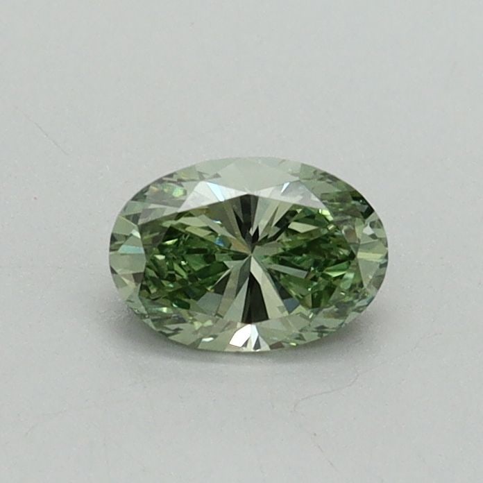 Loose Diamond - OVAL 0.34ct Fancy Vivid Green VVS2: Loose Diamond - OVAL 0.34ct Fancy Vivid Green VVS2 Source: This is a real non-mined Diamond that has been grown in a lab Shape: OVAL Carats: 0.34 Color: Fancy Vivid Green Certification: IGI Video: