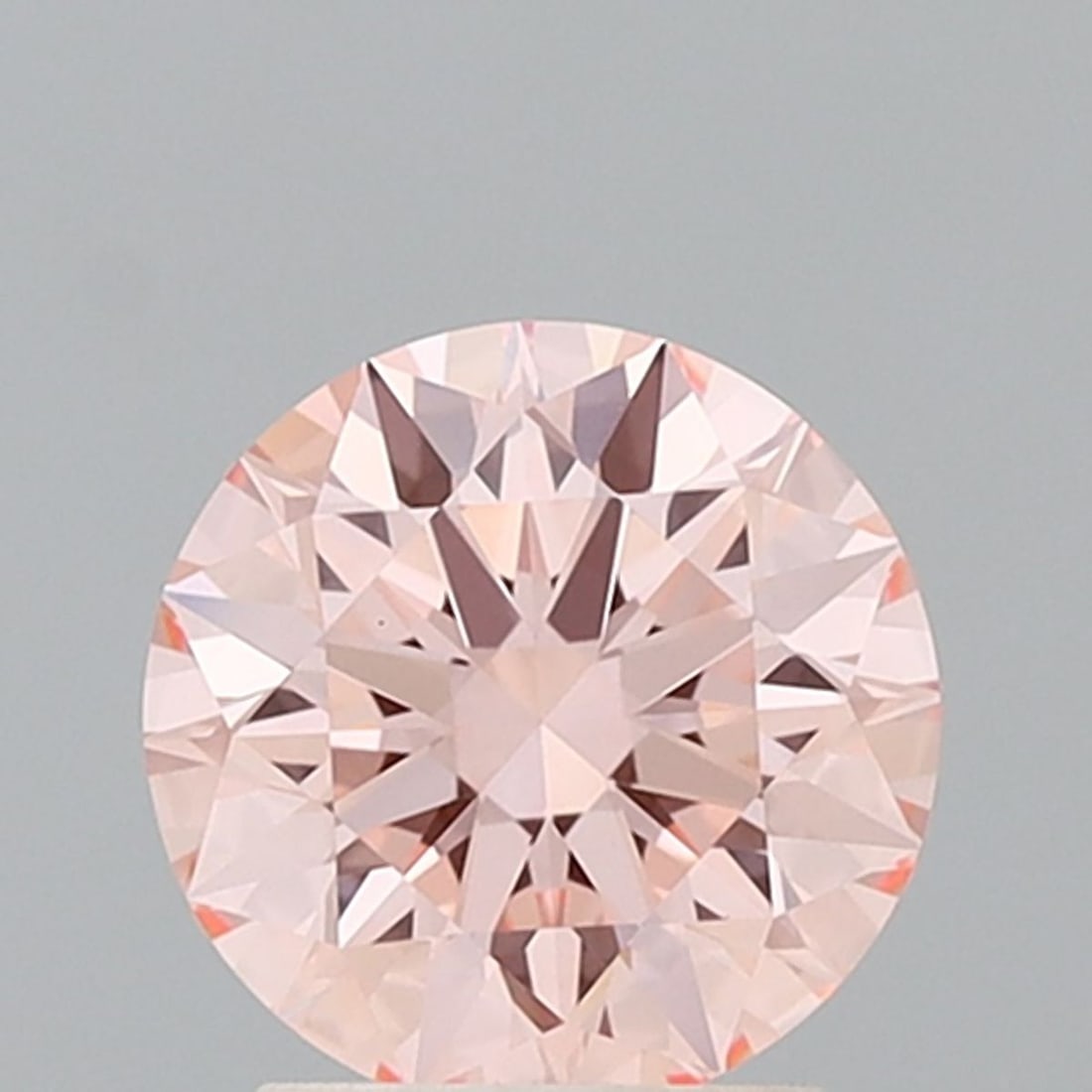 Ideal Loose Diamond - ROUND 0.75ct Fancy Vivid Pink VVS2: Ideal Loose Diamond - ROUND 0.75ct Fancy Vivid Pink VVS2 Source: This is a real non-mined Diamond that has been grown in a lab Shape: ROUND Carats: 0.75 Color: Fancy Vivid Pink Certification: IGI Vide