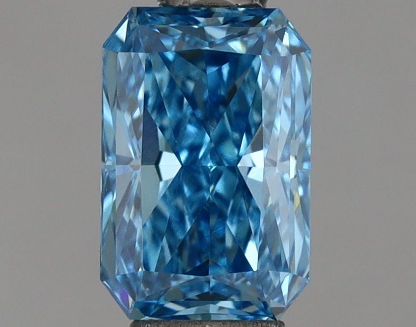 Loose Diamond - RADIANT 0.64ct Fancy Vivid Blue VS1: Loose Diamond - RADIANT 0.64ct Fancy Vivid Blue VS1 Source: This is a real non-mined Diamond that has been grown in a lab Shape: RADIANT Carats: 0.64 Color: Fancy Vivid Blue Certification: IGI Video: