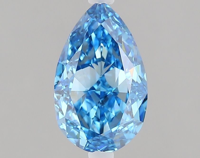 Loose Diamond - PEAR 1.01ct Fancy Vivid Blue VS1: Loose Diamond - PEAR 1.01ct Fancy Vivid Blue VS1 Source: This is a real non-mined Diamond that has been grown in a lab Shape: PEAR Carats: 1.01 Color: Fancy Vivid Blue Certification: IGI Video: