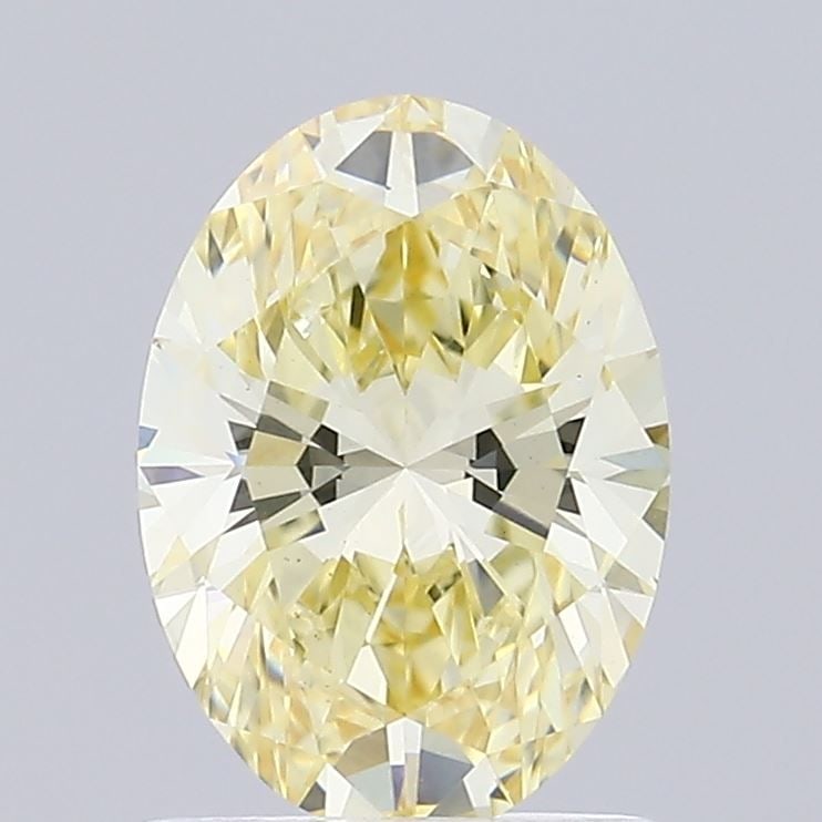 Loose Diamond - OVAL 1.02ct Fancy Yellow VS1: Loose Diamond - OVAL 1.02ct Fancy Yellow VS1 Source: This is a real non-mined Diamond that has been grown in a lab Shape: OVAL Carats: 1.02 Color: Fancy Yellow Certification: IGI Video: