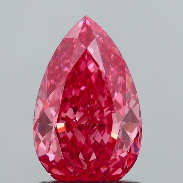 Loose Diamond - PEAR 1.1ct Fancy Vivid Pink VS1: Loose Diamond - PEAR 1.1ct Fancy Vivid Pink VS1 Source: This is a real non-mined Diamond that has been grown in a lab Shape: PEAR Carats: 1.1 Color: Fancy Vivid Pink Certification: IGI Video: