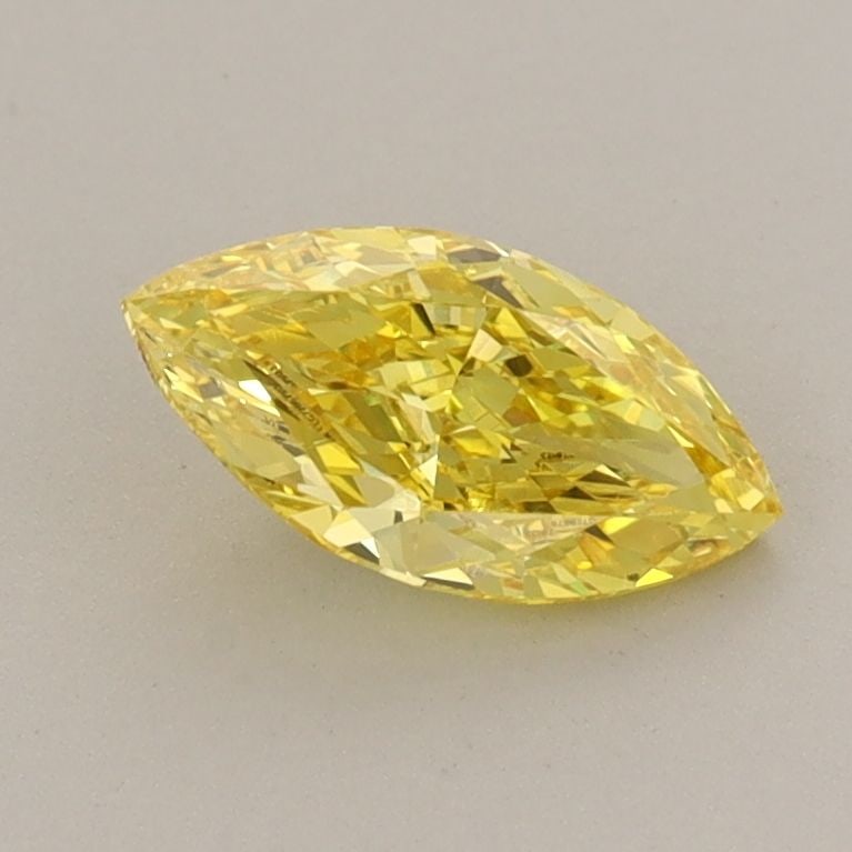 Loose Diamond - MARQUISE 0.7ct Fancy Vivid Yellow VVS2: Loose Diamond - MARQUISE 0.7ct Fancy Vivid Yellow VVS2 Source: This is a real non-mined Diamond that has been grown in a lab Shape: MARQUISE Carats: 0.7 Color: Fancy Vivid Yellow Certification: IGI Vi