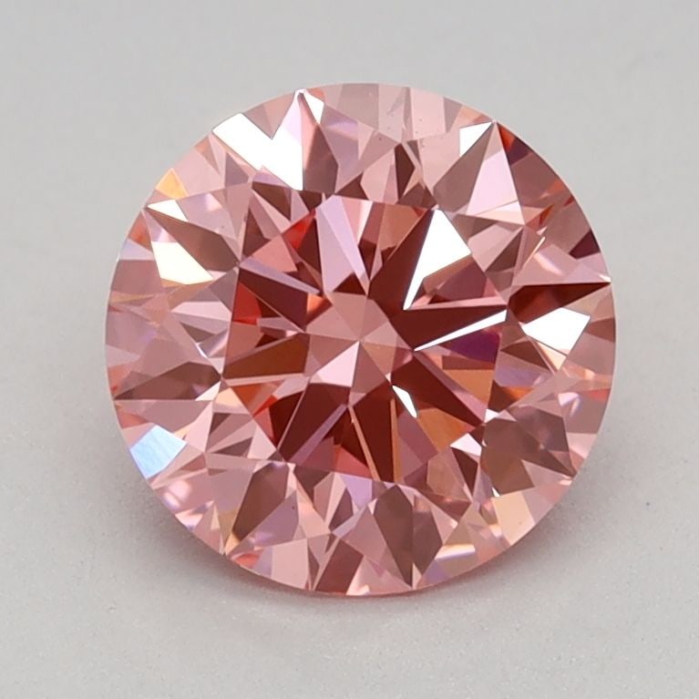Ideal Loose Diamond - ROUND 1.11ct Fancy Vivid Pink VS1: Ideal Loose Diamond - ROUND 1.11ct Fancy Vivid Pink VS1 Source: This is a real non-mined Diamond that has been grown in a lab Shape: ROUND Carats: 1.11 Color: Fancy Vivid Pink Certification: IGI Video