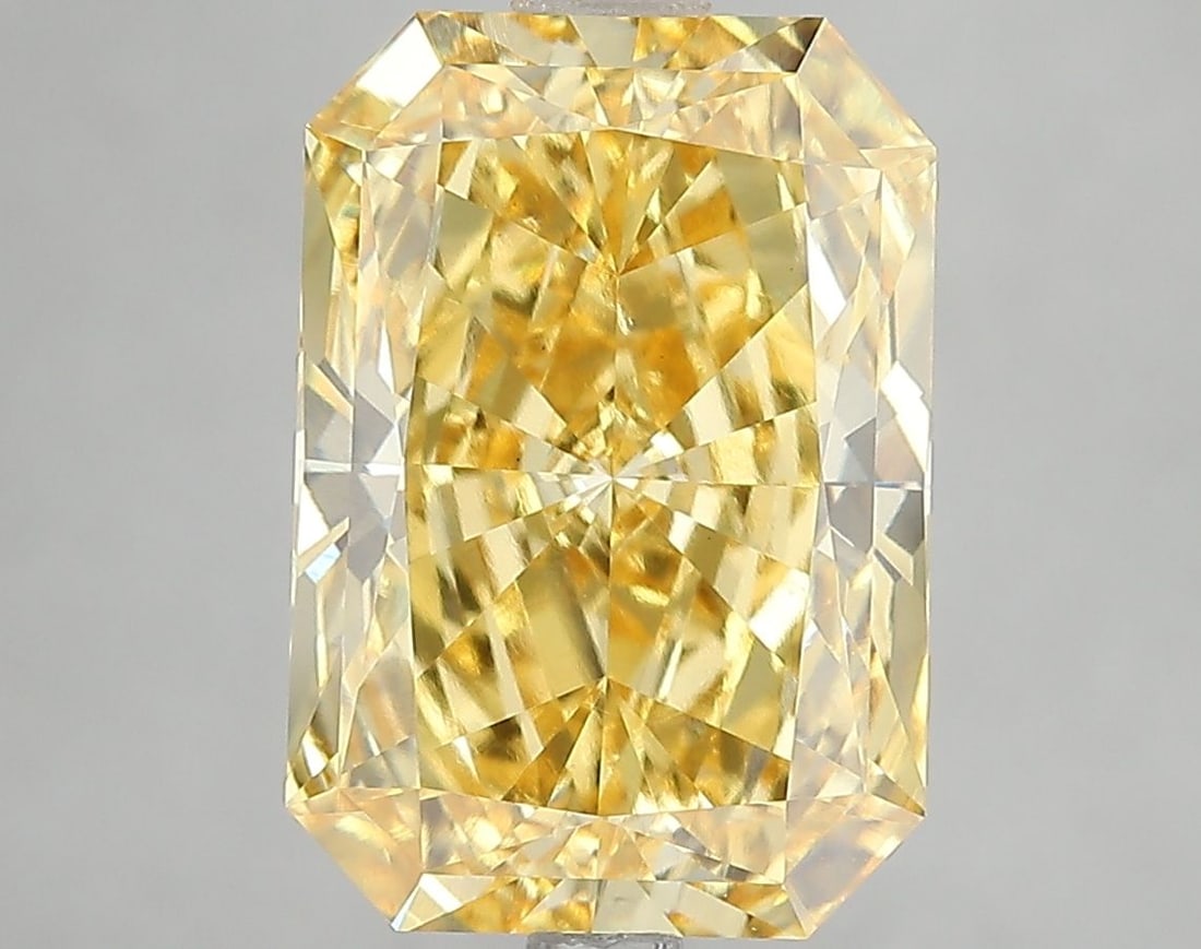 Loose Diamond - RADIANT 5.17ct Fancy Vivid Yellow VS1: Loose Diamond - RADIANT 5.17ct Fancy Vivid Yellow VS1 Source: This is a real non-mined Diamond that has been grown in a lab Shape: RADIANT Carats: 5.17 Color: Fancy Vivid Yellow Certification: IGI Vid