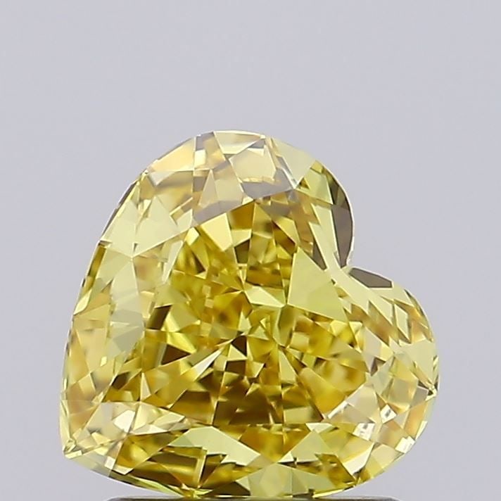Loose Diamond - HEART 1.4ct Fancy Vivid Yellow VVS2: Loose Diamond - HEART 1.4ct Fancy Vivid Yellow VVS2 Source: This is a real non-mined Diamond that has been grown in a lab Shape: HEART Carats: 1.4 Color: Fancy Vivid Yellow Certification: IGI Video: