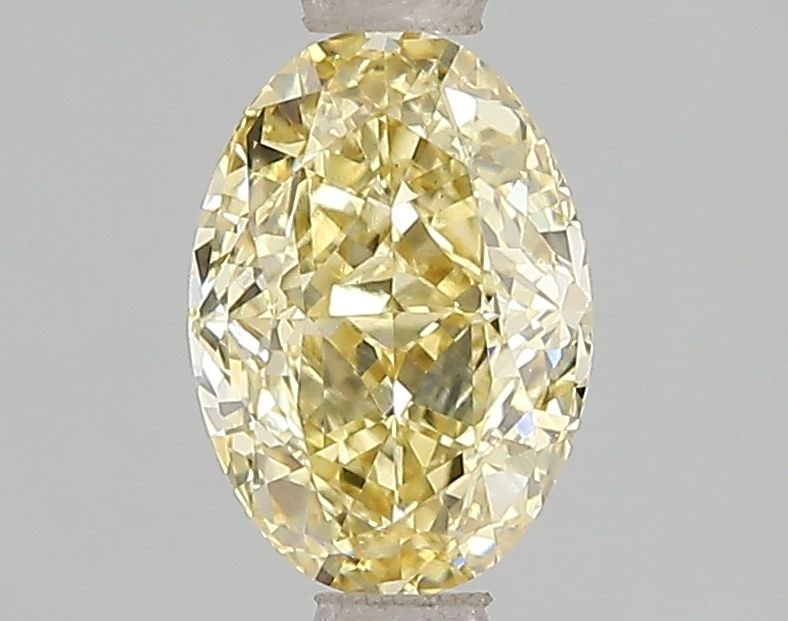 Loose Diamond - OVAL 1.51ct Fancy Vivid Yellow VS1: Loose Diamond - OVAL 1.51ct Fancy Vivid Yellow VS1 Source: This is a real non-mined Diamond that has been grown in a lab Shape: OVAL Carats: 1.51 Color: Fancy Vivid Yellow Certification: IGI Video: