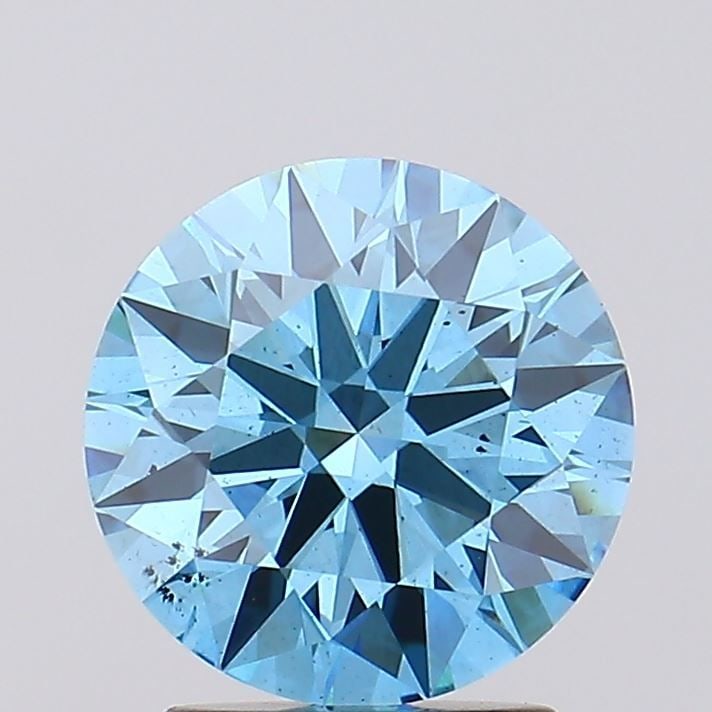 Ideal Loose Diamond - ROUND 2.19ct Fancy Vivid Blue VS2: Ideal Loose Diamond - ROUND 2.19ct Fancy Vivid Blue VS2 Source: This is a real non-mined Diamond that has been grown in a lab Shape: ROUND Carats: 2.19 Color: Fancy Vivid Blue Certification: IGI Video
