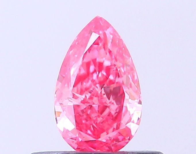 Loose Diamond - PEAR 0.36ct Fancy Vivid Pink VS2: Loose Diamond - PEAR 0.36ct Fancy Vivid Pink VS2 Source: This is a real non-mined Diamond that has been grown in a lab Shape: PEAR Carats: 0.36 Color: Fancy Vivid Pink Certification: IGI Video: