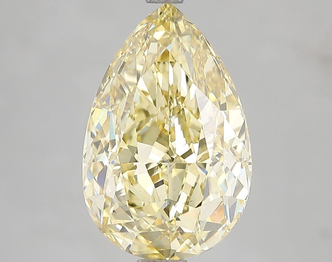 Loose Diamond - PEAR 5.03ct Fancy Vivid Yellow VS2: Loose Diamond - PEAR 5.03ct Fancy Vivid Yellow VS2 Source: This is a real non-mined Diamond that has been grown in a lab Shape: PEAR Carats: 5.03 Color: Fancy Vivid Yellow Certification: IGI Video: