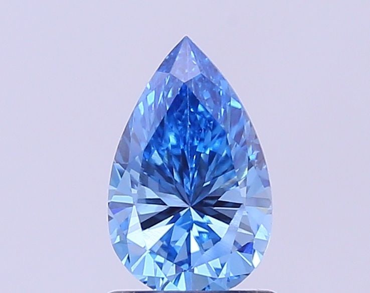 Loose Diamond - PEAR 0.98ct Fancy Vivid Blue VVS2: Loose Diamond - PEAR 0.98ct Fancy Vivid Blue VVS2 Source: This is a real non-mined Diamond that has been grown in a lab Shape: PEAR Carats: 0.98 Color: Fancy Vivid Blue Certification: IGI Video: