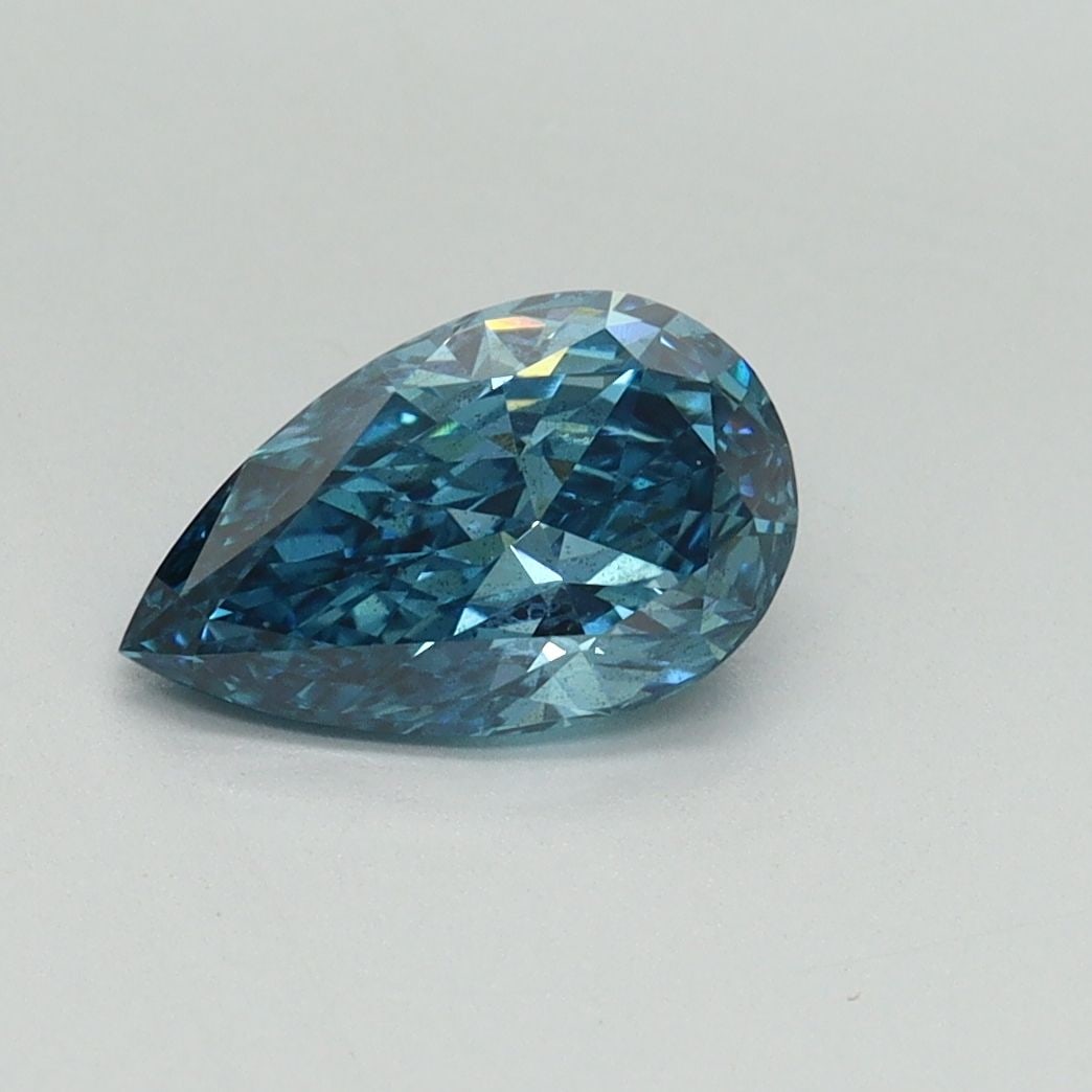 Loose Diamond - PEAR 1.03ct Fancy Vivid Blue SI2: Loose Diamond - PEAR 1.03ct Fancy Vivid Blue SI2 Source: This is a real non-mined Diamond that has been grown in a lab Shape: PEAR Carats: 1.03 Color: Fancy Vivid Blue Certification: IGI Video: