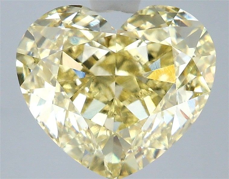 Loose Diamond - HEART 4.07ct Fancy Yellow VS1: Loose Diamond - HEART 4.07ct Fancy Yellow VS1 Source: This is a real non-mined Diamond that has been grown in a lab Shape: HEART Carats: 4.07 Color: Fancy Yellow Certification: IGI Video: