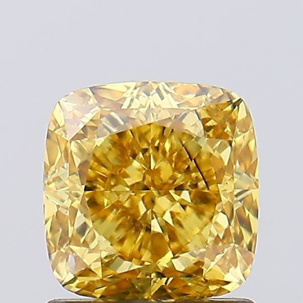 Loose Diamond - CUSHION MODIFIED 1.25ct Fancy Vivid Yellow SI1: Loose Diamond - CUSHION MODIFIED 1.25ct Fancy Vivid Yellow SI1 Source: This is a real non-mined Diamond that has been grown in a lab Shape: CUSHION MODIFIED Carats: 1.25 Color: Fancy Vivid Yellow Cert