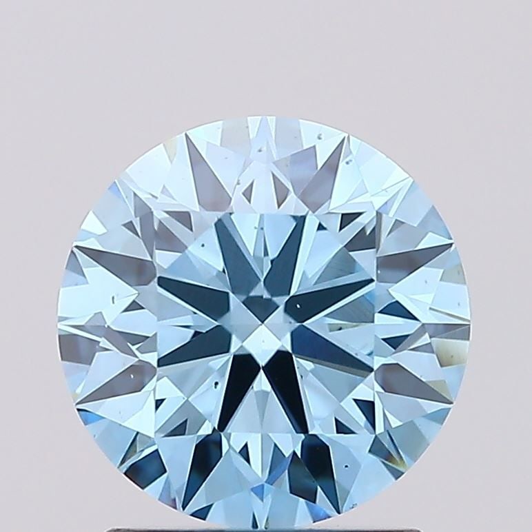 Ideal Loose Diamond - ROUND 1.54ct Fancy Vivid Blue VS2: Ideal Loose Diamond - ROUND 1.54ct Fancy Vivid Blue VS2 Source: This is a real non-mined Diamond that has been grown in a lab Shape: ROUND Carats: 1.54 Color: Fancy Vivid Blue Certification: IGI Video