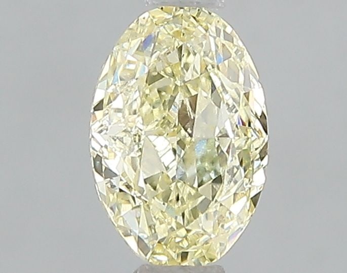 Loose Diamond - OVAL 1.04ct Fancy Light Yellow VS2: Loose Diamond - OVAL 1.04ct Fancy Light Yellow VS2 Source: This is a real non-mined Diamond that has been grown in a lab Shape: OVAL Carats: 1.04 Color: Fancy Light Yellow Certification: IGI Video: