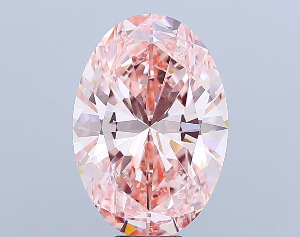 Loose Diamond - OVAL 11.2ct Fancy Vivid Pink VVS2: Loose Diamond - OVAL 11.2ct Fancy Vivid Pink VVS2 Source: This is a real non-mined Diamond that has been grown in a lab Shape: OVAL Carats: 11.2 Color: Fancy Vivid Pink Certification: IGI Video: