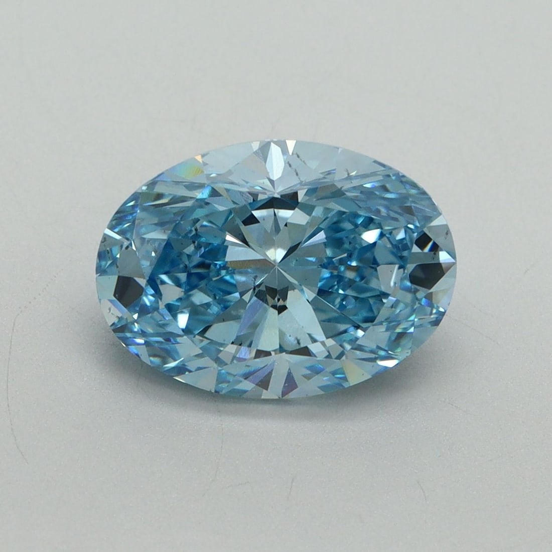 Loose Diamond - OVAL 3.1ct Fancy Vivid Blue SI1: Loose Diamond - OVAL 3.1ct Fancy Vivid Blue SI1 Source: This is a real non-mined Diamond that has been grown in a lab Shape: OVAL Carats: 3.1 Color: Fancy Vivid Blue Certification: IGI Video: