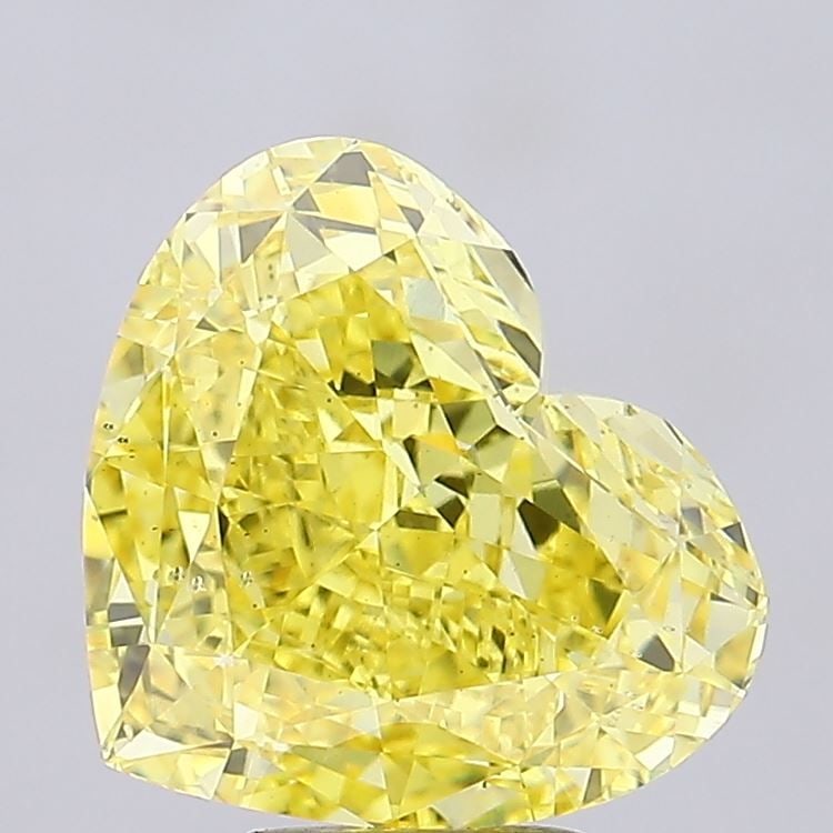 Loose Diamond - HEART 7.03ct Fancy Vivid Yellow SI1: Loose Diamond - HEART 7.03ct Fancy Vivid Yellow SI1 Source: This is a real non-mined Diamond that has been grown in a lab Shape: HEART Carats: 7.03 Color: Fancy Vivid Yellow Certification: IGI Video: