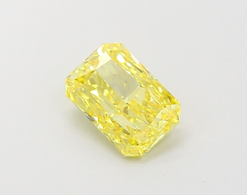 Loose Diamond - RADIANT 1.01ct Fancy Vivid Yellow VS1: Loose Diamond - RADIANT 1.01ct Fancy Vivid Yellow VS1 Source: This is a real non-mined Diamond that has been grown in a lab Shape: RADIANT Carats: 1.01 Color: Fancy Vivid Yellow Certification: IGI Vid