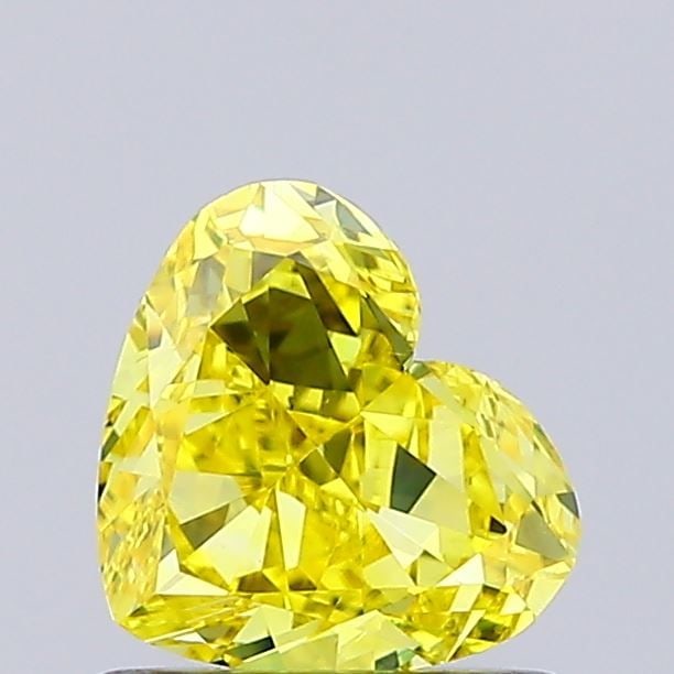 Loose Diamond - HEART 0.98ct Fancy Vivid Yellow VS2: Loose Diamond - HEART 0.98ct Fancy Vivid Yellow VS2 Source: This is a real non-mined Diamond that has been grown in a lab Shape: HEART Carats: 0.98 Color: Fancy Vivid Yellow Certification: IGI Video: