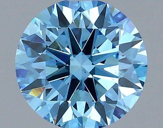 Loose Diamond - ROUND 1.0ct Fancy Vivid Blue VS2: Loose Diamond - ROUND 1.0ct Fancy Vivid Blue VS2 Source: This is a real non-mined Diamond that has been grown in a lab Shape: ROUND Carats: 1.0 Color: Fancy Vivid Blue Certification: IGI Video: