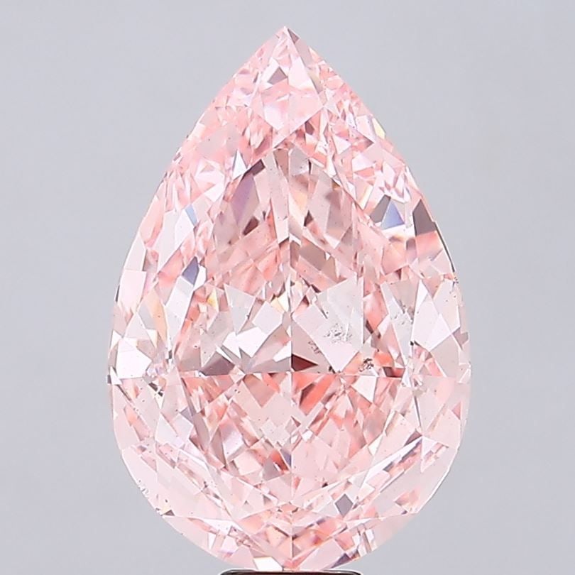 Loose Diamond - PEAR 20.2ct Fancy Vivid Pink VS2: Loose Diamond - PEAR 20.2ct Fancy Vivid Pink VS2 Source: This is a real non-mined Diamond that has been grown in a lab Shape: PEAR Carats: 20.2 Color: Fancy Vivid Pink Certification: IGI Video: