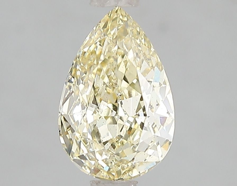 Loose Diamond - PEAR 1.54ct Fancy Yellow VS2: Loose Diamond - PEAR 1.54ct Fancy Yellow VS2 Source: This is a real non-mined Diamond that has been grown in a lab Shape: PEAR Carats: 1.54 Color: Fancy Yellow Certification: IGI Video: