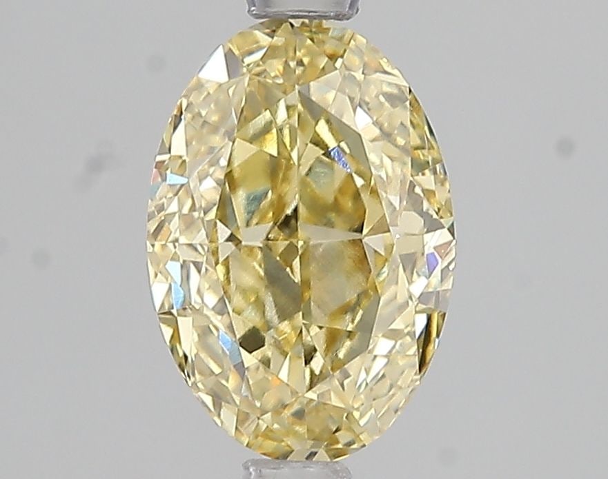 Loose Diamond - OVAL 2.02ct Fancy Intense Yellow VS1: Loose Diamond - OVAL 2.02ct Fancy Intense Yellow VS1 Source: This is a real non-mined Diamond that has been grown in a lab Shape: OVAL Carats: 2.02 Color: Fancy Intense Yellow Certification: IGI Video