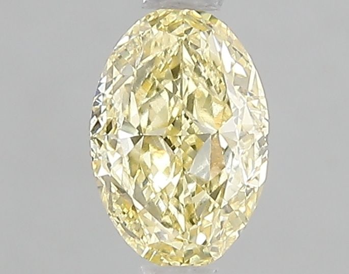 Loose Diamond - OVAL 1.01ct Fancy Yellow VS1: Loose Diamond - OVAL 1.01ct Fancy Yellow VS1 Source: This is a real non-mined Diamond that has been grown in a lab Shape: OVAL Carats: 1.01 Color: Fancy Yellow Certification: IGI Video: