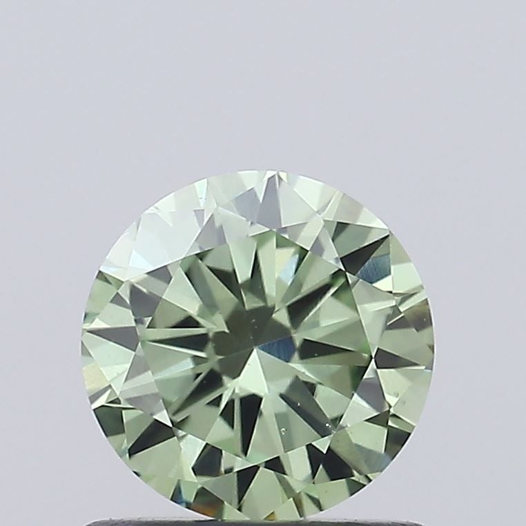 Loose Diamond - ROUND 0.81ct Fancy Vivid Green VS1: Loose Diamond - ROUND 0.81ct Fancy Vivid Green VS1 Source: This is a real non-mined Diamond that has been grown in a lab Shape: ROUND Carats: 0.81 Color: Fancy Vivid Green Certification: IGI Video: