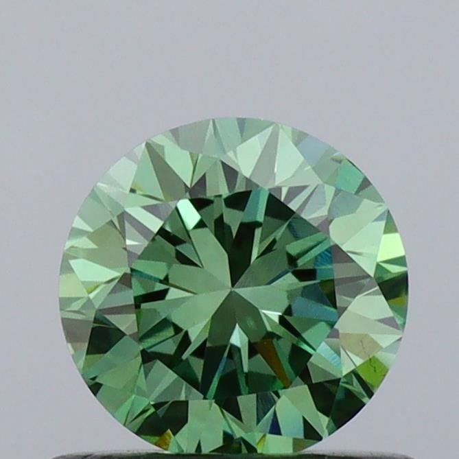 Loose Diamond - ROUND 0.61ct Fancy Vivid Green VS1: Loose Diamond - ROUND 0.61ct Fancy Vivid Green VS1 Source: This is a real non-mined Diamond that has been grown in a lab Shape: ROUND Carats: 0.61 Color: Fancy Vivid Green Certification: IGI Video:
