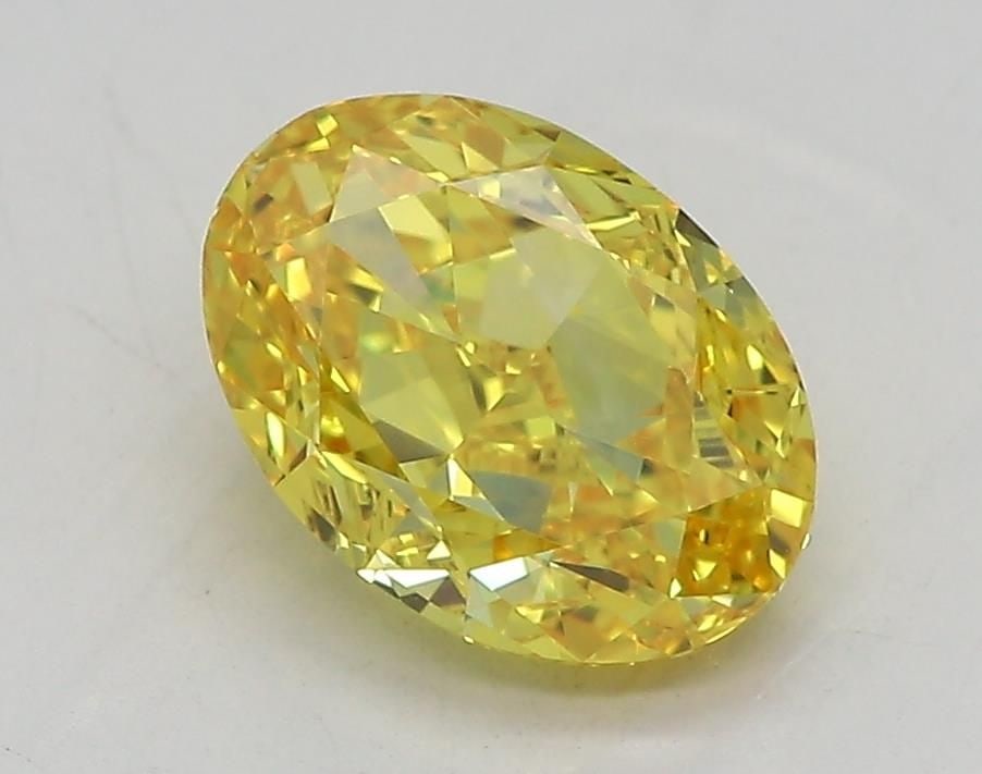 Loose Diamond - OVAL 1.54ct Fancy Vivid Yellow VVS2: Loose Diamond - OVAL 1.54ct Fancy Vivid Yellow VVS2 Source: This is a real non-mined Diamond that has been grown in a lab Shape: OVAL Carats: 1.54 Color: Fancy Vivid Yellow Certification: IGI Video: