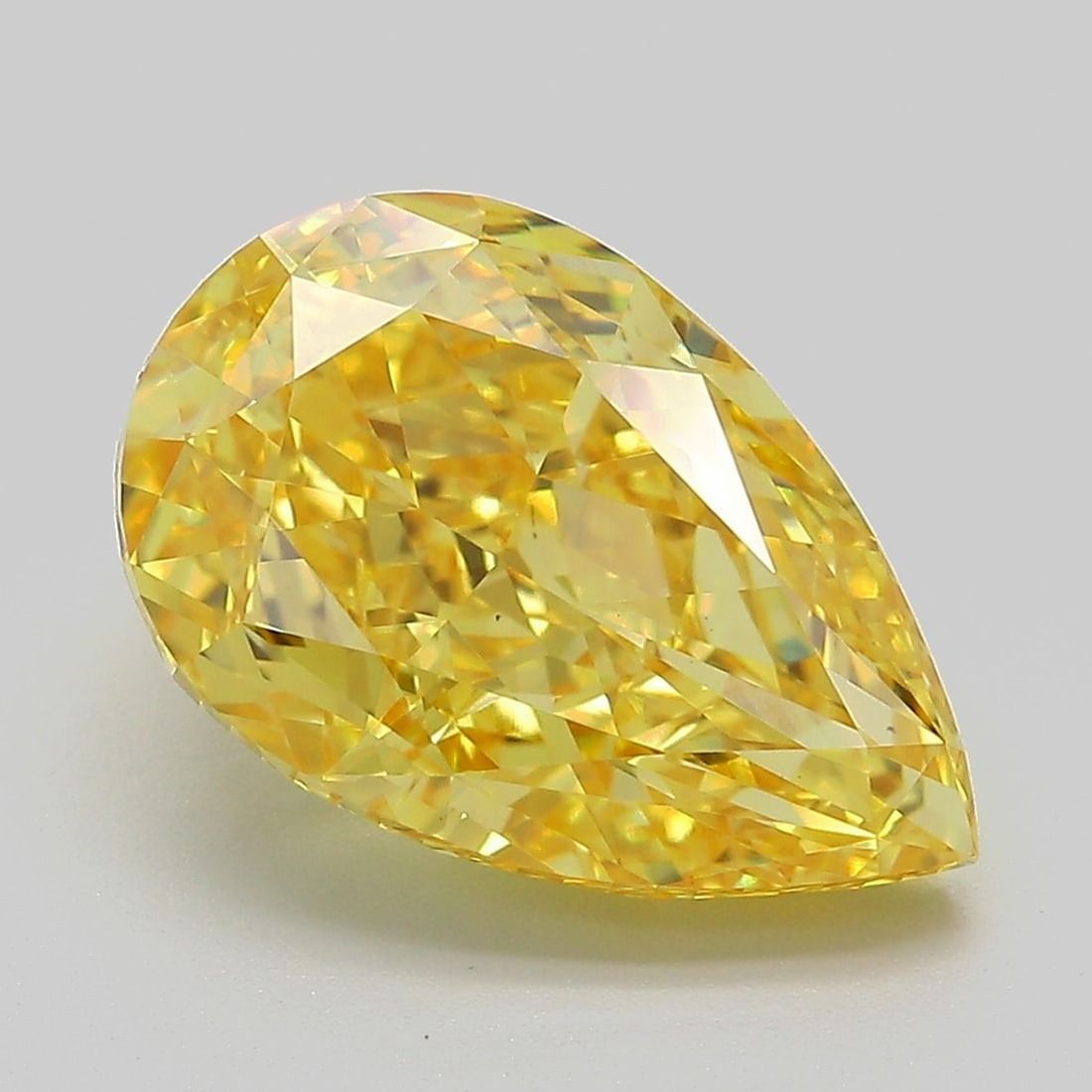Loose Diamond - PEAR 5.38ct Fancy Vivid Yellow VS1: Loose Diamond - PEAR 5.38ct Fancy Vivid Yellow VS1 Source: This is a real non-mined Diamond that has been grown in a lab Shape: PEAR Carats: 5.38 Color: Fancy Vivid Yellow Certification: IGI Video: